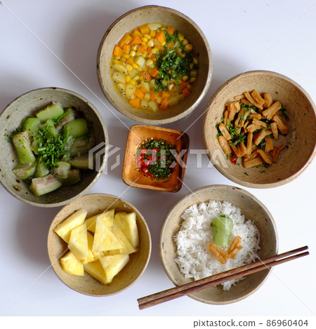 Vietnamese daily meal for lunch, tray of rice dish, vegan menu good for health Vietnamese daily meal for lunch, tray of rice dish, vegan menu good for health 86960404