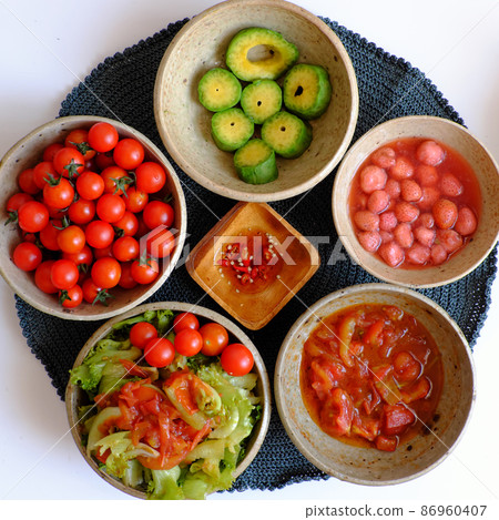 Vietnamese healthy food with vegan ingredient, salad mix with tomato sauce, strawberry, avocado Vietnamese healthy food with vegan ingredient, salad mix with tomato sauce, strawberry, avocado 86960407
