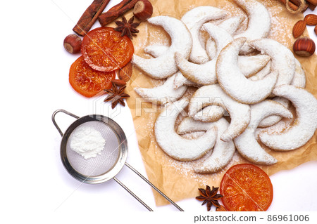 Traditional German or Austrian Vanillekipferl vanilla kipferl cookies isolated on white background Traditional German or Austrian Vanillekipferl vanilla kipferl cookies isolated on white background 86961006