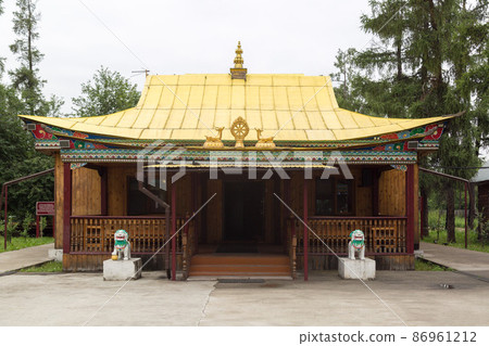 A large Buddhist temple datsan with a golden roof A large Buddhist temple datsan with a golden roof 86961212