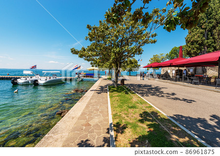 Promenade on Lakeshore of Lake Garda - Bardolino Verona Veneto Italy 86961875