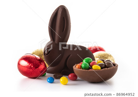 Easter chocolate bunny and colorful eggs Easter chocolate bunny and colorful eggs 86964952