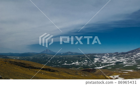 View to Viluchinsky volcano from caldera Mutnovsky, Kamchatka peninsula Russia View to Viluchinsky volcano from caldera Mutnovsky, Kamchatka peninsula Russia 86965431