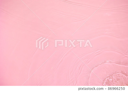transparent pink colored clear calm water surface texture  86966250