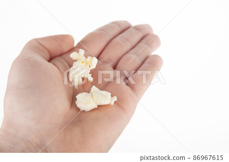 image of pop corn hand white background image of pop corn hand white background 86967615