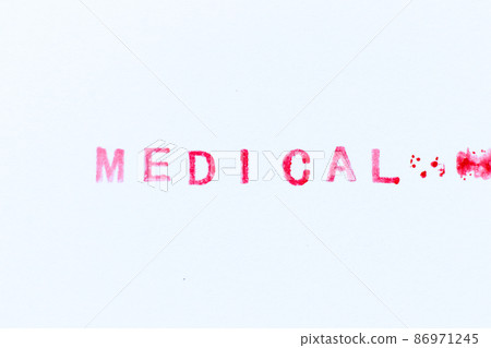 Red color ink rubber stamp in word medical on white paper background Red color ink rubber stamp in word medical on white paper background 86971245
