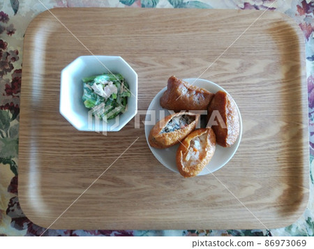 Inari sushi and salad light meal Inari sushi and salad light meal 86973069