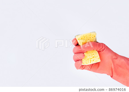 Cleaning service concept man holding sponge Cleaning service concept man holding sponge 86974016