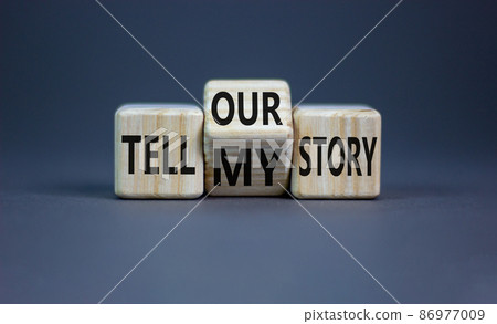 Tell my or our story. Turned wooden cubes and changed words tell my story to tell our story. Beautiful grey background, copy space. Business, storytelling and my or our story concept. Tell my or our story. Turned wooden cubes and changed words tell my story to tell our story. Beautiful grey background, copy space. Business, storytelling and my or our story concept. 86977009