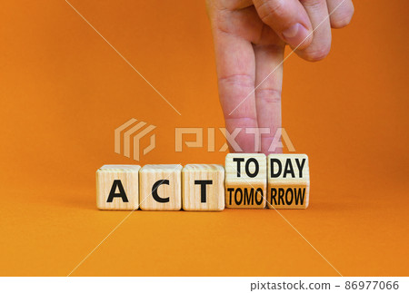 Act today not tomorrow symbol. Businessman turns wooden cubes, changes words act tomorrow to act today. Beautiful orange table, orange background. Business, act today or tomorrow concept, copy space. Act today not tomorrow symbol. Businessman turns wooden cubes, changes words act tomorrow to act today. Beautiful orange table, orange background. Business, act today or tomorrow concept, copy space. 86977066