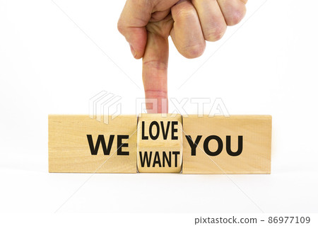 We want and love you symbol. Businessman turns the wooden cube and changes words we want you to we love you. Beautiful white background, copy space. Business, support we want and love you concept. We want and love you symbol. Businessman turns the wooden cube and changes words we want you to we love you. Beautiful white background, copy space. Business, support we want and love you concept. 86977109