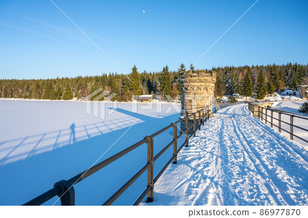 Sunny winter evenign at water dam 86977870