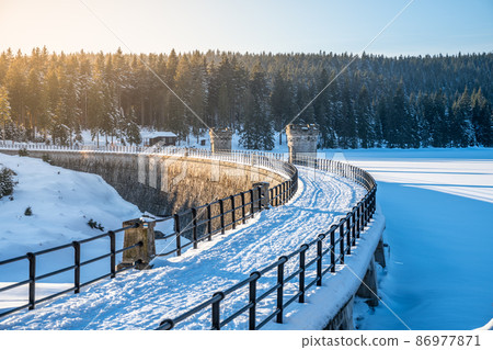 Sunny winter evenign at water dam 86977871