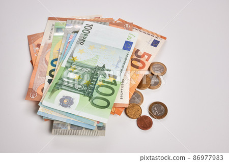 Photo of Euro Banknotes and Coins Photo of Euro Banknotes and Coins 86977983