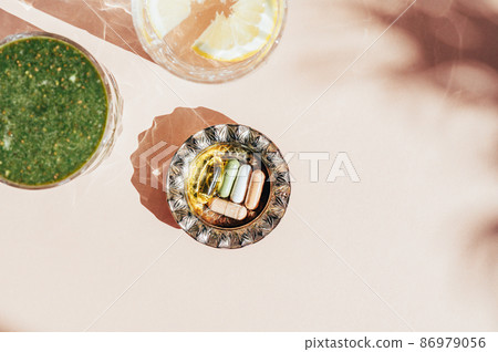 Green Smoothie, Lemon Water and Vitamins Green Smoothie, Lemon Water and Vitamins 86979056