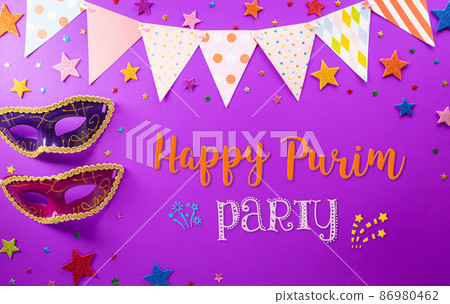 Happy Purim carnival decoration concept made from mask and sparkle star on purple background. (Happy Purim in Hebrew, jewish holiday celebrate) 86980462