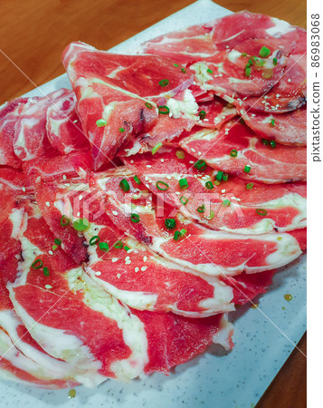 Grilled raw meat cooking on wagyu grill Grilled raw meat cooking on wagyu grill 86983068