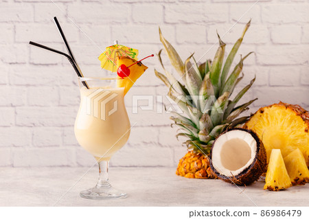 Traditional caribbean cocktail pina colada in a glass. 86986479