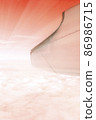 A wonderful view from the window of an airplane: red-orange and light like the setting sun 86986715