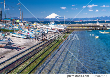 《Kanagawa Prefecture》 Mt. Fuji and fishing boat Manase fishing port 86987335
