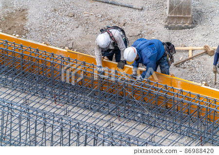 Reinforcing bar construction, reinforcement reinforcement, foundation work, construction site Reinforcing bar construction, reinforcement reinforcement, foundation work, construction site 86988420