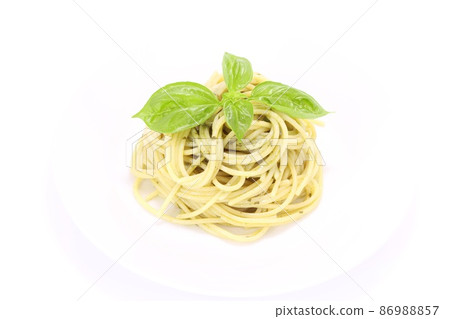 Spaghetti pasta genovese basil sauce bright background lunch Spaghetti pasta genovese basil sauce bright background lunch 86988857