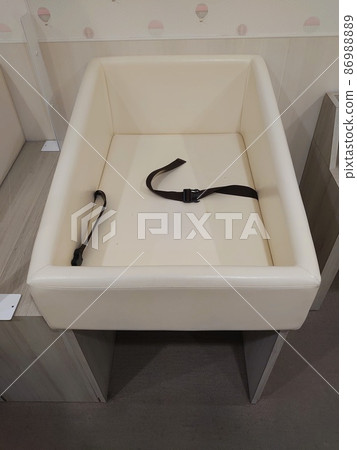 A diaper changing table maintained in a commercial facility 86988889