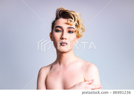 body positive i love myself man with gorgeous make up and hairstyle in studio white background 86991236