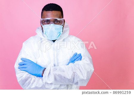 Corona Virus SARS-CoV-2 vaccination concept : man in pink studio wall background 86991259