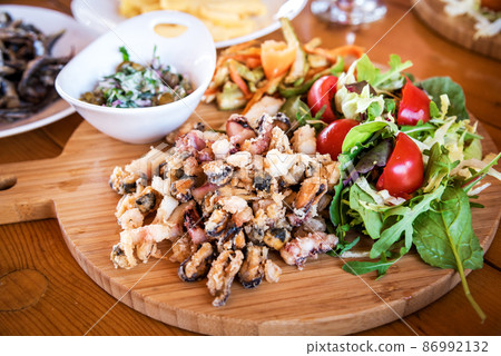 Grilled rapana dish on Black Sea, Mangalia - Romania 86992132