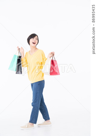 A young woman shopping A young woman shopping 86993435