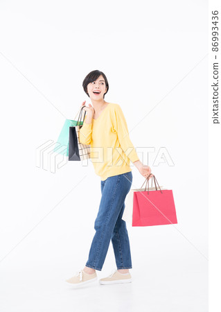 A young woman shopping A young woman shopping 86993436
