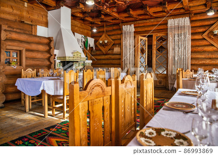 Interior of famous Ukrainian restaurant Hutsulshchyna, Yaremche. 86993869