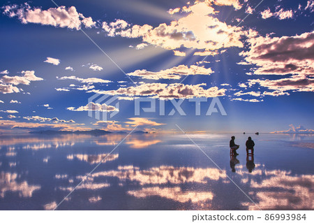 Beautiful evening view of Mirror Lake Uyuni salt lake 86993984