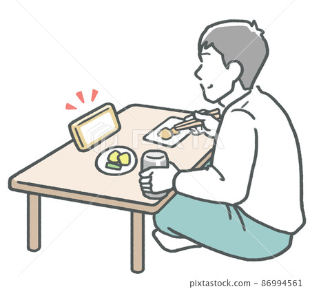 一個年輕人一邊看智能手機上的視頻分發一邊獨自吃米飯 86994561