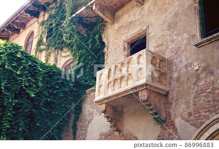 Juliet Capulet Balcony in Verona, Italy. Scanned film photo. 86996883