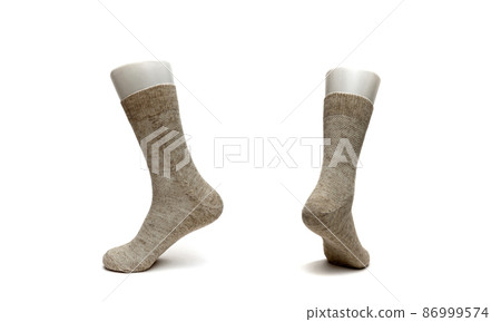 warm women's sock made of wool on a white background warm women's sock made of wool on a white background 86999574
