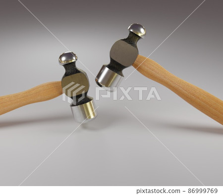 Chisel and small block plane with wood shavings. Carpenter cabinet maker hand tools on the workbench. 86999769