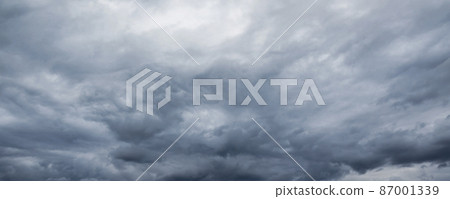 Cloudy dark stormy sky panorama. Natural background 87001339