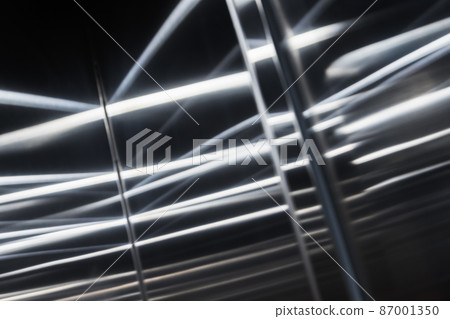 Brushed shiny metal wall with blurred reflections pattern 87001350