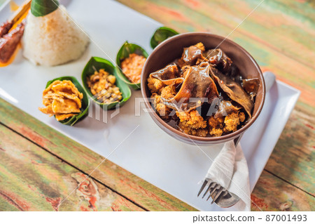 Lifestyle food. A dish consisting of rice, fried fish with wood mushrooms and different kinds of sauces 87001493