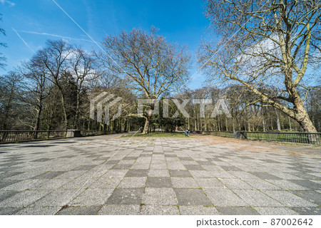 Deserted paved square in the Ossegem citypark in the Heysel borrow in Laeken 87002642