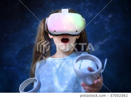 Kid using virtual reality headset, cute child looking in VR glasses 87002862