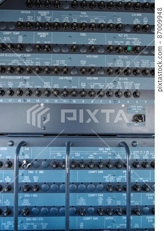 Aircraft flight deck with buttons and knobs 87009948