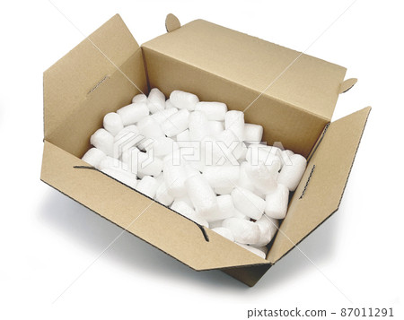 Cardboard and rose cushioning material from diagonally above white background 87011291