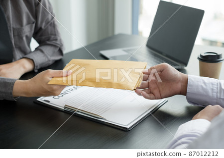Corruption. Businessmen make an agreement with the money proposed his partner to bribe in the office and make a contract under an agreement. Illegal money fraud The concept of bribery and corruption 87012212