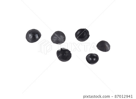 charcoal macadamia isolated on white background charcoal macadamia isolated on white background 87012941