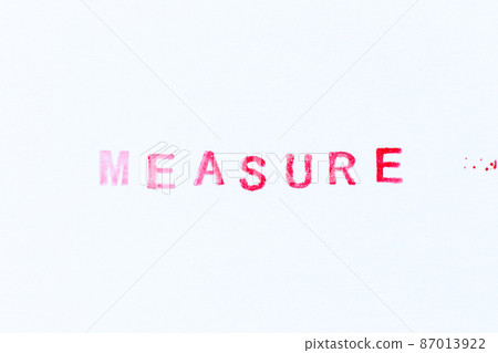 Red color ink rubber stamp in word measure on white paper background 87013922