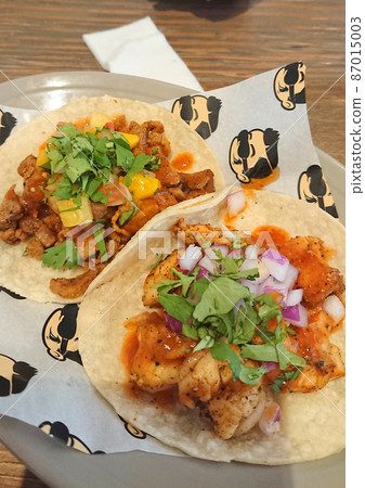 Tacos tortillas at a Mexican bar Tacos tortillas at a Mexican bar 87015003