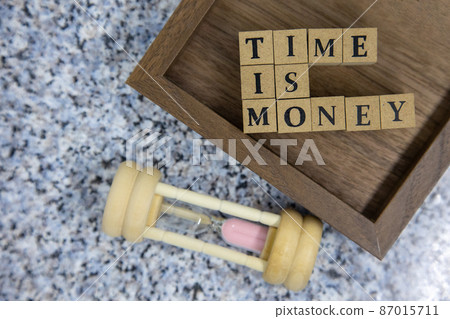 Character block and hourglass TIME IS MONEY 87015711